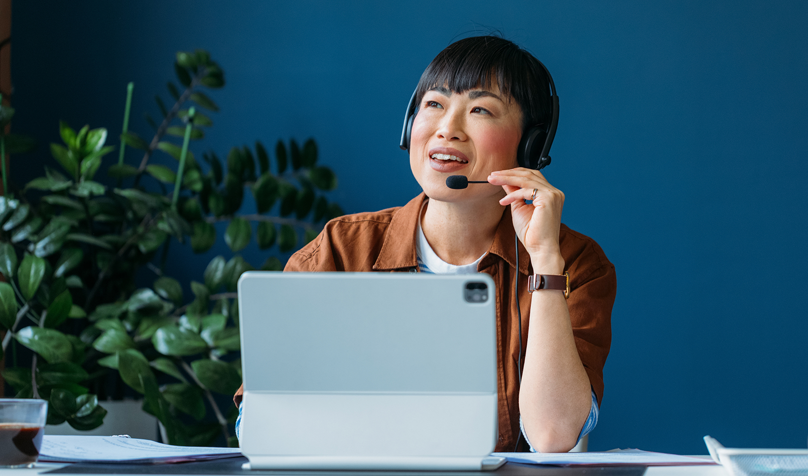 A customer service representative taking calls