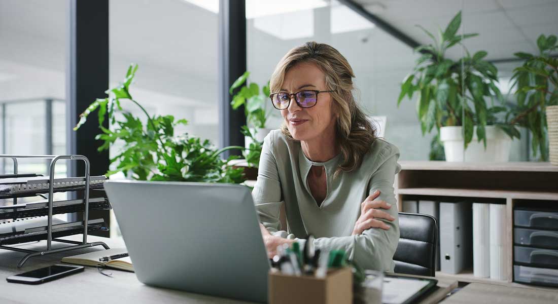 A woman researching economic reports